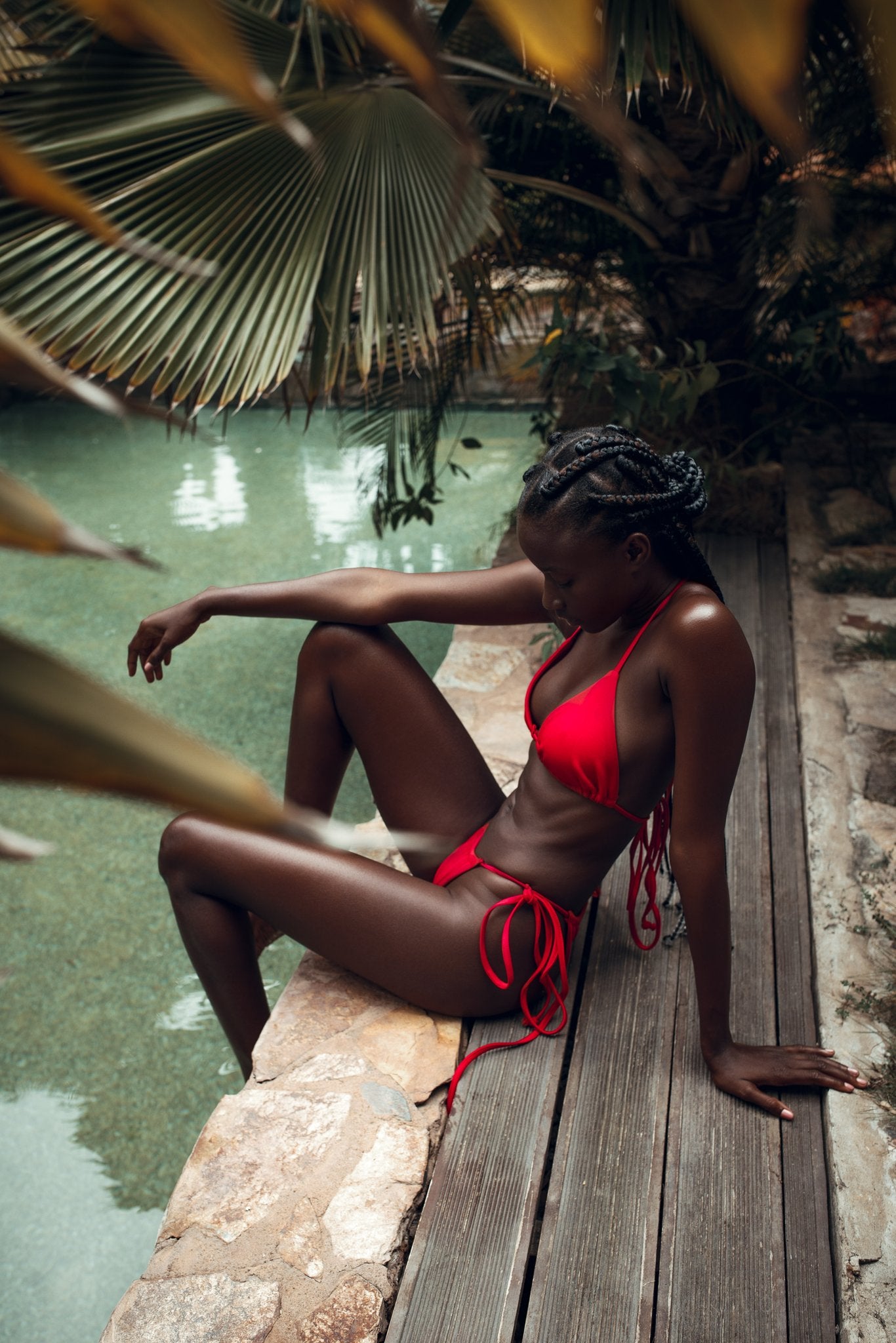 Bold red bikini featuring a stylish design, perfect for making a striking statement at the beach or pool, embodying confidence and summer energy