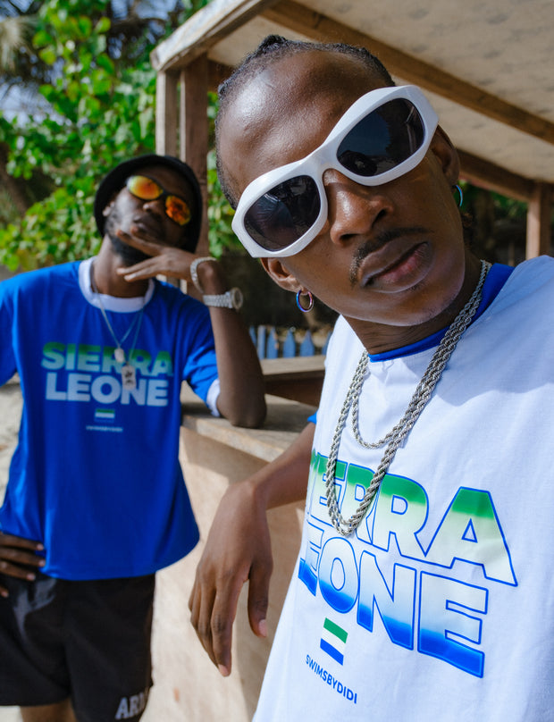 Sierra Leone-inspired T shirt with bold, vibrant colors and patterns, capturing the essence of West African culture and style in a modern, cropped design.