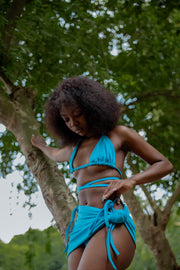 Trendy Knotty Skirt featuring a unique knot detail at the waist, made from soft fabric that drapes elegantly, perfect for casual outings or summer events.
