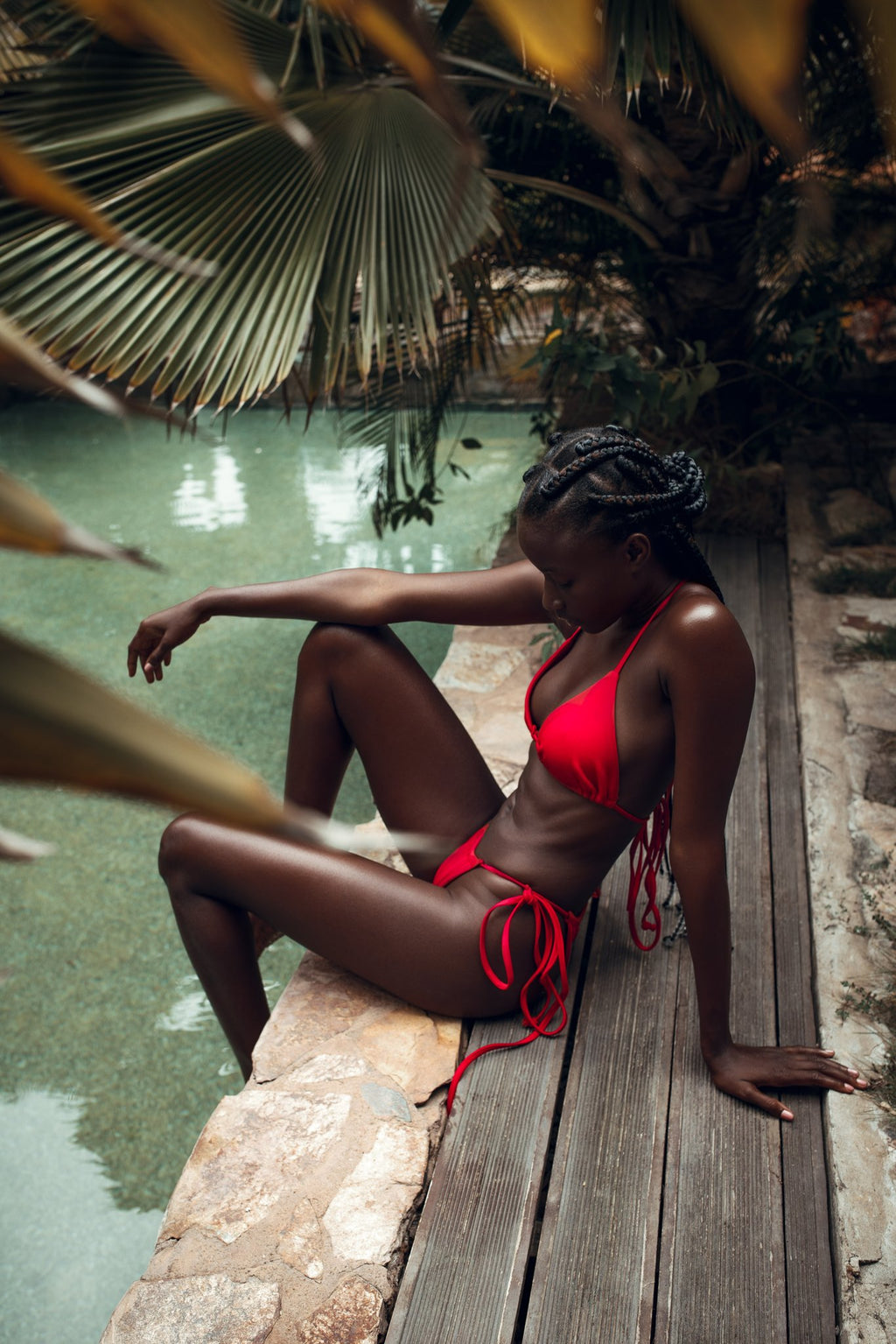 Bold red bikini featuring a stylish design, perfect for making a striking statement at the beach or pool, embodying confidence and summer energy